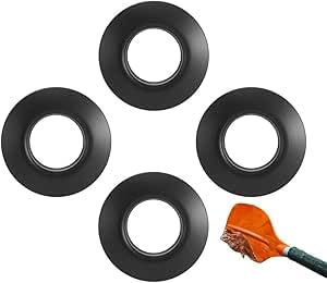 Vier schwarze wasserdichte Tropfringe aus PVC-Gummi für Paddel mit zentraler Öffnung, ideal für Kajak-, Kanu- und Rafting-Sportarten.